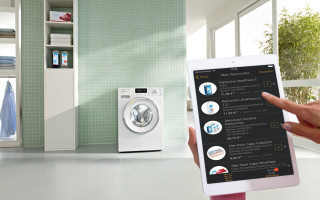 Mieles smarte Waschmaschine bedient via Tablet