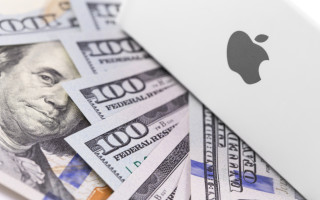 Logo von Apple mit Geldscheinen